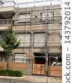 House with scaffolding erected for repair work, Tokyo 143792014