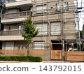 House with scaffolding erected for repair work, Tokyo 143792015