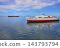 Ferry Ship on Blue Water Near Port Angeles Washington Under Vibrant Summer Sky 143793794