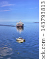 Ferry and Boat on Calm Water with Blue Sky in Port Angeles Washington 143793813