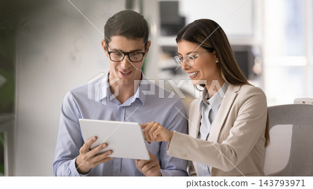 Positive business expert woman giving professional help to male coworker 143793971