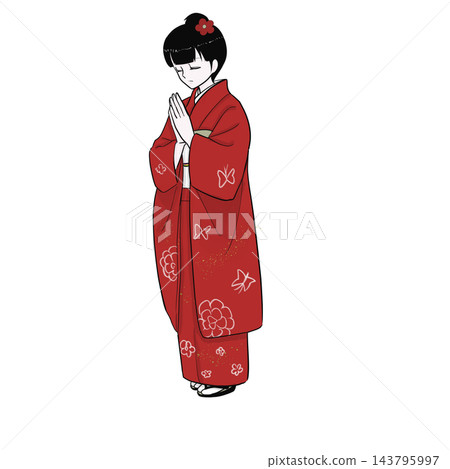 A woman in a furisode kimono clasps her hands together and prays at a shrine for the first time of the year. 143795997