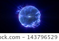 Blue holographic globe glows as futuristic interface against dark background. Spherical digital form combines sparkling particles, flowing illuminated contours and concentrated central flare. 143796529