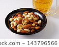 Mixed nuts and beer 143796566