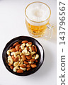 Mixed nuts and beer 143796567