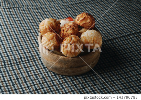 assorted Catalan panellets in a wooden bowl assorted Catalan panellets in a wooden bowl 143796785