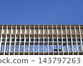 Building facade with concrete vertical brise soleil fins 143797263