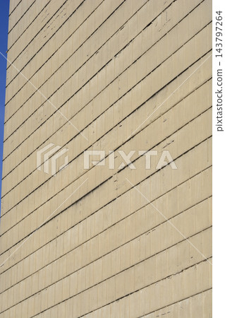Concrete tower facade with linear textured surface details Concrete tower facade with linear textured surface details 143797264