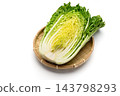Cross-section of a cabbage cut lengthwise 143798293