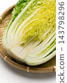 Cross-section of a cabbage cut lengthwise 143798296