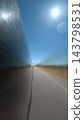 Vertical Long Exposure Car on Empty Sunlit Road 143798531