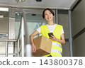 Female delivery driver 143800378