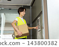 Female delivery driver 143800382