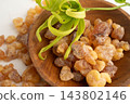 Frankincense or olibanum aromatic resin isolated on white background used in incense and perfumes. 143802146