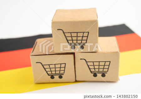 Germany flag with Shopping cart box, import export, finance commerce. Germany flag with Shopping cart box, import export, finance commerce. 143802150