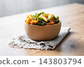 Dry tricolor fusilli pasta in bowl 143803794