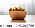 Dry tricolor fusilli pasta in bowl 143803796