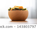 Dry tricolor fusilli pasta in bowl 143803797