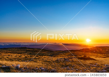 Burning sunset above clouds, Serra da Estrela, Portugal. Burning sunset above clouds, Serra da Estrela, Portugal. 143803850