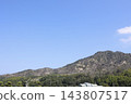 Burnt trees and mountainside after a wildfire. Copy space against a clear blue sky. Asakura district, Imabari City, Ehime Prefecture. 143807517