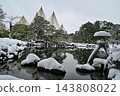 Snow-covered Kenrokuen Garden with snow ropes 143808022