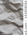 A crumpled white background texture that highlights wrinkles and dents. 143808084