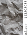 A crumpled white background texture that highlights wrinkles and dents. 143808086