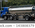 A tanker truck in motion 143808379