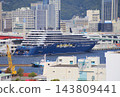 The luxury cruise ship "Luminara," operated by The Ritz-Carlton Yacht Collection, is currently docked at Kobe Port. 143809441