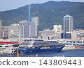The luxury cruise ship "Luminara," operated by The Ritz-Carlton Yacht Collection, is currently docked at Kobe Port. 143809443