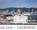 The luxury cruise ship "Luminara," operated by The Ritz-Carlton Yacht Collection, is currently docked at Kobe Port. 143809445