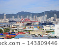 The luxury cruise ship "Luminara," operated by The Ritz-Carlton Yacht Collection, is currently docked at Kobe Port. 143809446