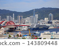 The luxury cruise ship "Luminara," operated by The Ritz-Carlton Yacht Collection, is currently docked at Kobe Port. 143809448