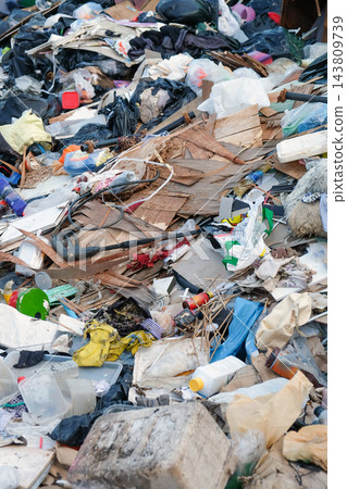 Pile of garbage and plastic waste on the ground Pile of garbage and plastic waste on the ground 143809739