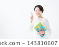A woman studying for a qualification - risking 143810607