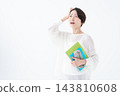 A woman studying for a qualification - risking 143810608
