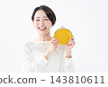 A woman with a wallet wallet 143810611