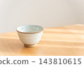 Empty teacups and tableware 143810615