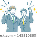 The men put their arms around each other's shoulders in joy. 143810865