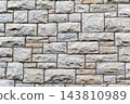 Rough Pale Stone Wall Texture with Rectangular Masonry Blocks 143810989