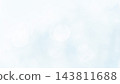 A soft, light blue background; an image of the sky, sea, and water. 143811688