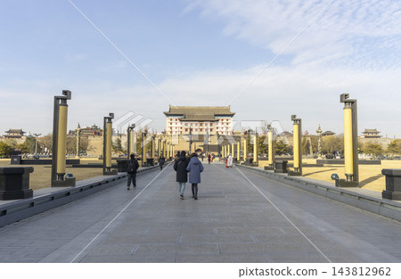 Xi'an, China - Dec 30, 2024 : The towers and city wall of of the south gate of Xi'an, China in Dec 30, 2024. Xi'an, China - Dec 30, 2024 : The towers and city wall of of the south gate of Xi'an, China in Dec 30, 2024. 143812962