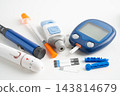 Glucometer lancet and test stick measuring human blood sugar level for diabetes. 143814679