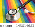 Stethoscope on LGBT rainbow flag, rights and gender equality. 143814683