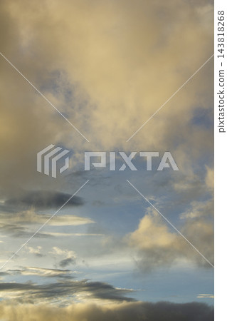 It is an atmospheric sunset sky. 143818268