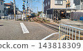 Railway tracks and level crossings running through residential areas in Japan. 143818309