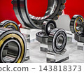 Display of industrial bearings on stands at a trade show exhibit 143818373