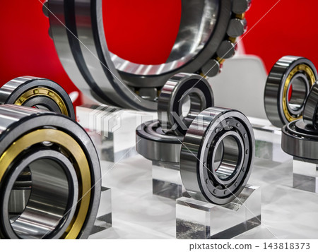Display of industrial bearings on stands at a trade show exhibit Display of industrial bearings on stands at a trade show exhibit 143818373