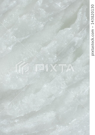 Solid coconut oil texture top down vertical view 143820130