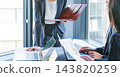Several business people having a meeting in the office 143820259